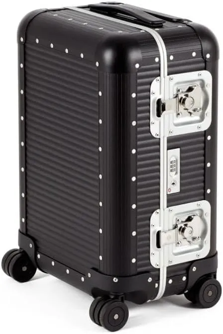 Milano Bank 55 Spinner, Durable and Luxurious Luggage Made in Italy, 4-wheel Spinner for Smooth Travel, Integrated TSA Lock, Fine Leather Straps, Caviar Black, Check-In 22-Inch